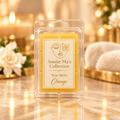 Orange wax melts with cream-and-gold branding